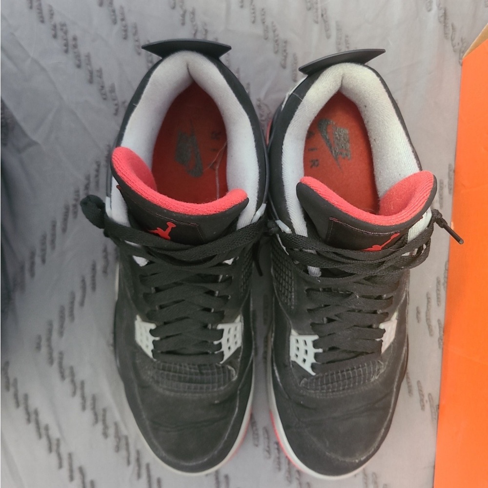Air Jordan 4 Retro Black and Red Sneakers with box